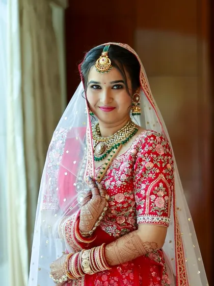 A happy and confident bride. Her smile and the soft glam makeup create a look of pure joy and elegance.