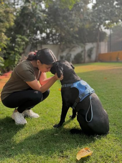 A moment of deep connection with Laika. Her guardian's trust means everything to us.