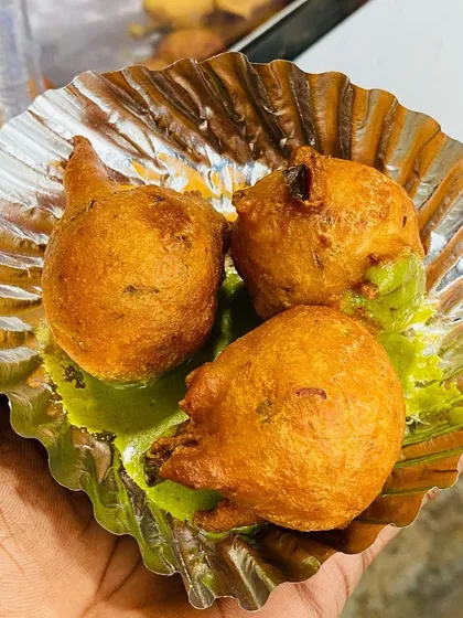 Another look at the Mangalore Bondas, a popular choice for evening tiffin. The unique shape comes from the way the batter is dropped into the hot oil.