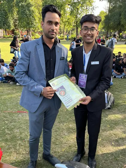 Receiving a certificate of appreciation from the NSS unit of Shri Ram College of Commerce.