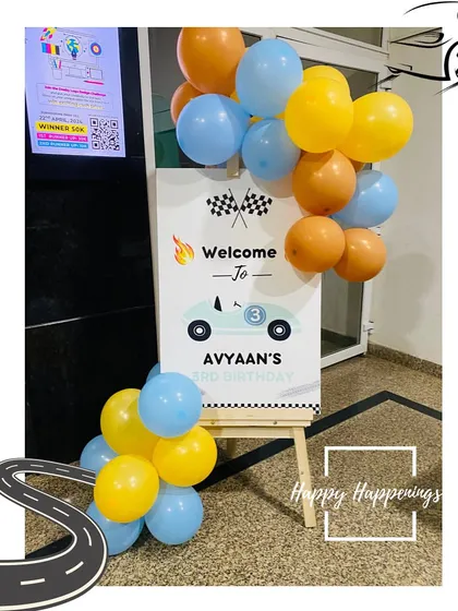 Welcome aboard! This welcome sign for Avyaan's car-themed party features a cute car graphic and checkered flags, setting a fun and energetic tone right from the entrance.