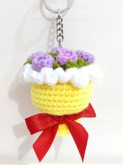 My most popular item, the mini bouquet keychain. I create these in various flower types like roses and sunflowers, and in a wide range of color combinations.
