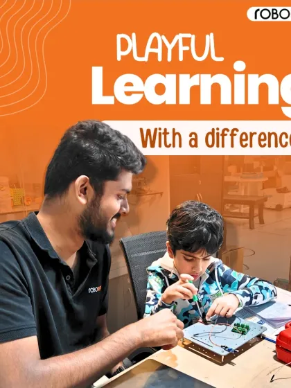 We make learning playful and personal. An instructor guides one of our young students through the basics of building a circuit, demonstrating our commitment to small class sizes and one-on-one attention.