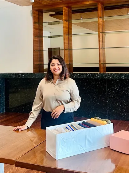 A photo from my recent wardrobe organizing workshop, where I demonstrated how to use simple tools like drawer organizers to create calm and order. I am available for both corporate and community workshops.