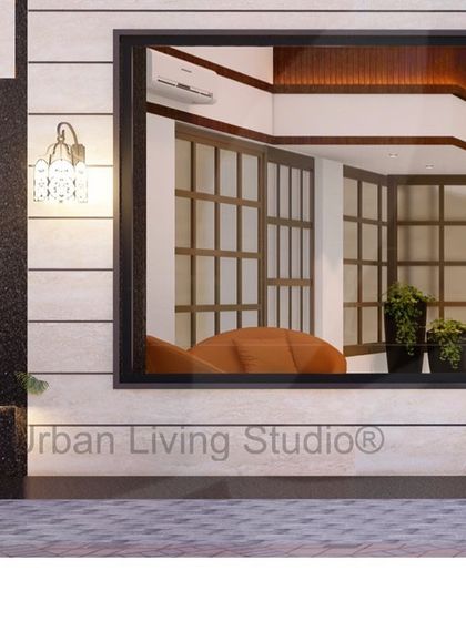 A view of the ground-floor window of the proposed foyer, showcasing the elegant wall sconce and planter that add to the building's curb appeal. The design blends interior and exterior elements seamlessly.