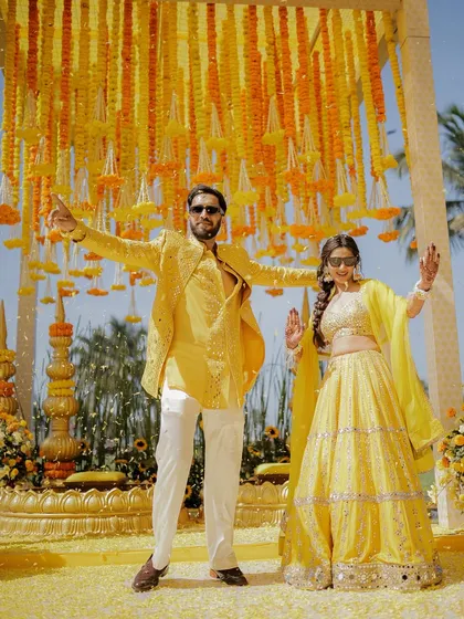 A Haldi in Goa just hits different. This couple wanted a classic, fun-filled event, and we delivered with a stunning marigold-draped seating area and a whole lot of dhol madness.