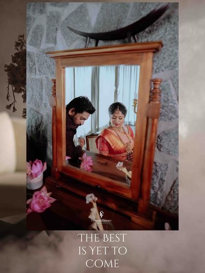 A creative shot of the couple's reflection in a wooden vanity mirror. The text "The best is yet to come" perfectly captures the hopeful spirit of their journey.