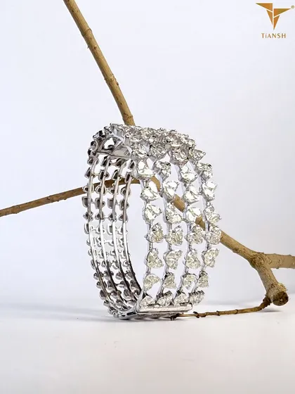 Meticulously crafted, this multi-row diamond bracelet showcases expert workmanship. Each diamond is set with precision, highlighting the quality and attention to detail in every curve.
