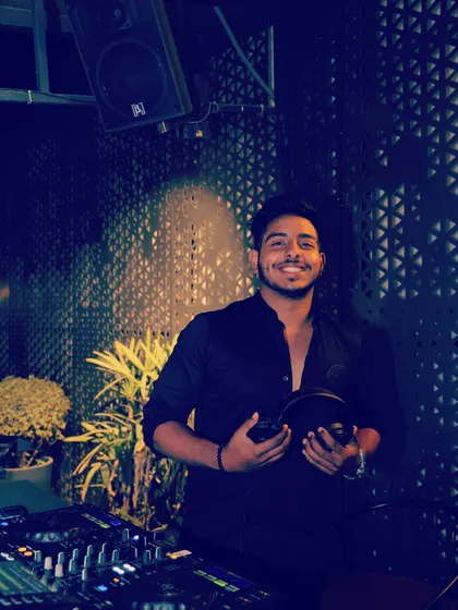 A happy moment behind the decks. I genuinely love what I do, and I think that joy and energy translate directly to the dance floor.
