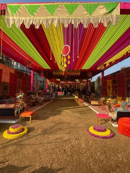 This Haldi ceremony was a celebration of vibrant Kathiyawadi culture. I used a riot of color with traditional textiles, multi-hued drapes, and rustic seating to create an authentic and joyful atmosphere. This shows my passion for creating culturally rich, high-energy pre-wedding events that are full of life.