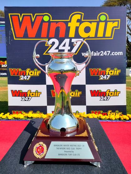 The Mysore Race Club Trophy, a classic two-handled silver cup.