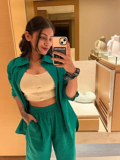 I love a good co-ord set. This comfortable green corduroy set, with a button-up crop top and matching trousers, is perfect for travel or a casual day.