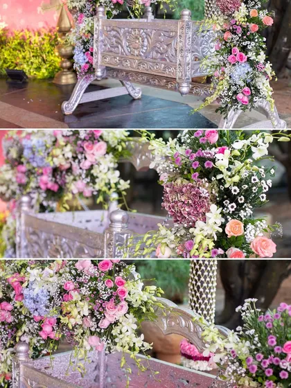 A naming ceremony is a precious milestone. We designed this beautiful floral cradle, blending soft pastel blooms with a traditional silver jhoola to create a delicate and memorable centerpiece for the baby's special day.