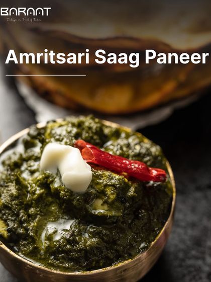 Indulge in the flavours of Punjab with our Amritsari Saag Paneer. Creamy spinach is infused with aromatic spices and paired with tender cubes of paneer.