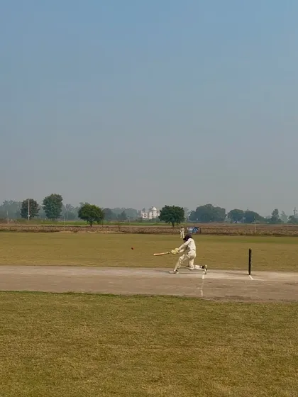 A powerful shot from Sagar during his century innings.