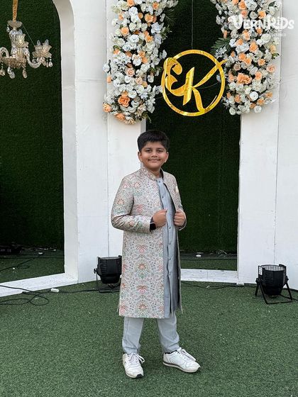 Dressed to perfection for a family wedding. This young client looks dapper in his custom-made Indo-western sherwani, proving that style and comfort can go hand-in-hand.