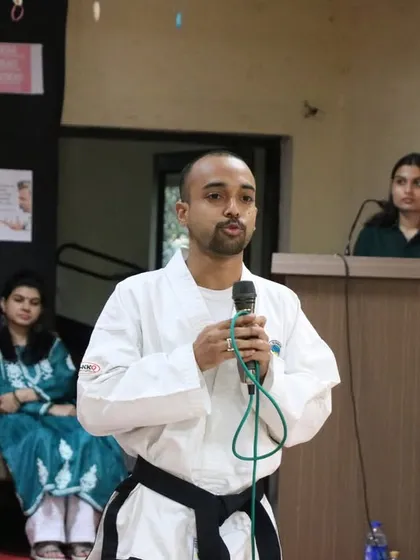 Communication is the foundation of our teaching. Here, I am explaining the psychological aspects of self-defense, including managing fear and projecting confidence, at the Sri Aurobindo College event.