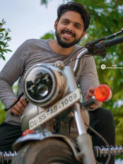 While I love candid shots, I also do posed lifestyle portraits. This photo from a biker photoshoot shows how we can work together to create a specific look, in this case capturing the cool, relaxed vibe of a rider and his Royal Enfield.