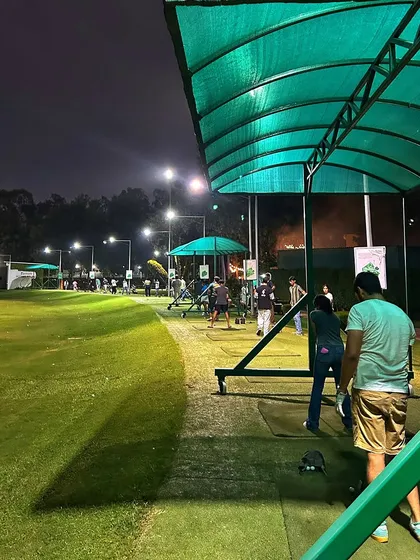 The view from our covered bays at night. The floodlights create the perfect setting for a late-night practice session.