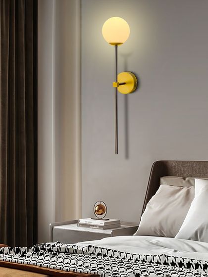 As a bedside light, the globe sconce is both beautiful and practical. It provides a soft glow that is perfect for winding down at the end of the day.
