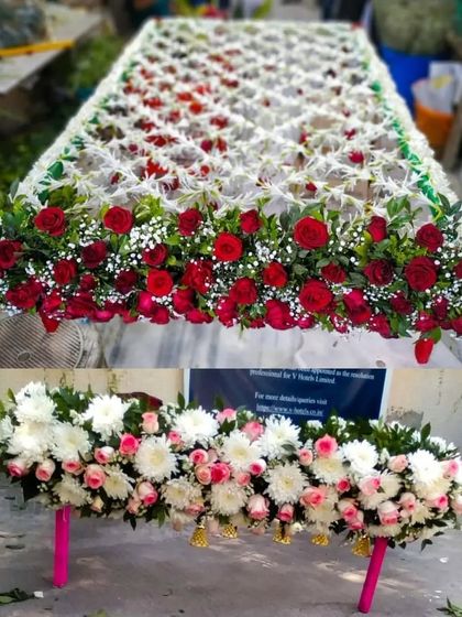 Here are two more real flower chadar options. The top design features a classic combination of red roses and white rajnigandha, while the bottom one uses white chrysanthemums and pink roses with hanging bells.