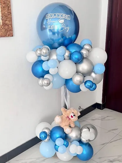 A "Welcome little boy" balloon standee. This is a great, long-lasting alternative to a helium bouquet and can be customized with a personalized message.