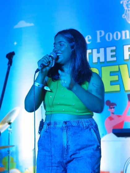 A candid moment of joy on stage. My goal is to have as much fun as the audience, and this picture captures that perfectly.