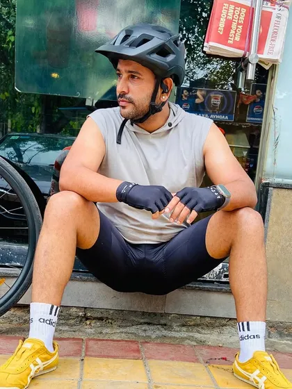 A cyclist taking a well-deserved rest. These candid moments show the real, unposed side of our weekend adventures.