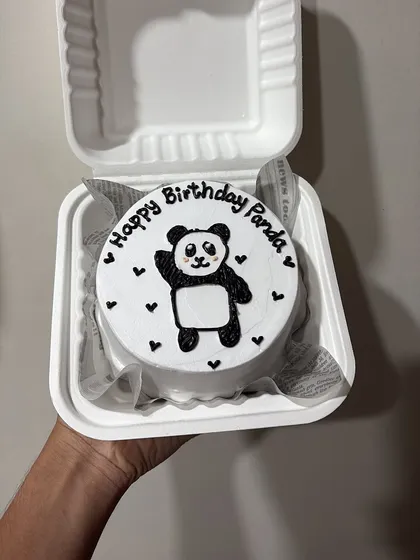 "Happy Birthday Panda" on a mini bento cake. I love creating these simple, hand-drawn designs that bring a smile to your face.