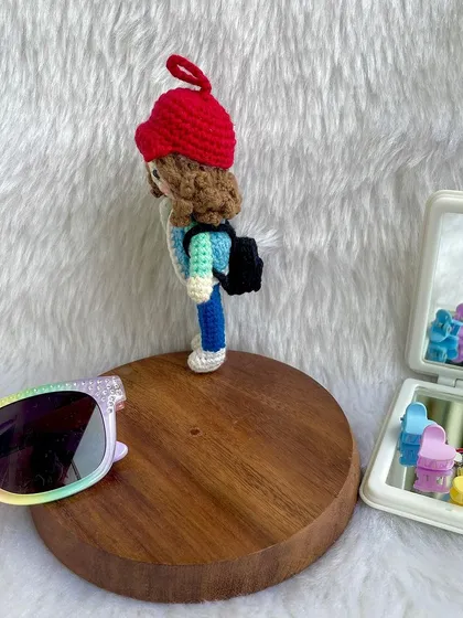 My first miniature replica doll, just 4 inches tall! This little adventurer comes with a red hat, a tiny backpack, and lots of personality. It shows that great things come in small packages.