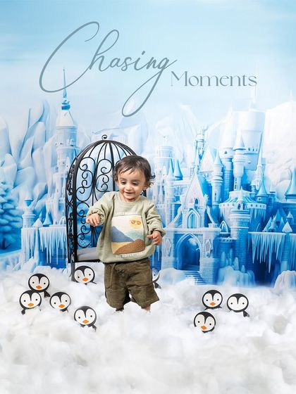 Chasing moments in a winter wonderland. This little one is exploring a magical snowy landscape, surrounded by friendly penguins and an enchanting ice castle.