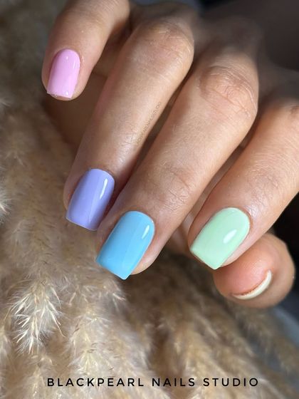 Another view of the pastel candy nails, showing the beautiful array of soft, sweet colors.