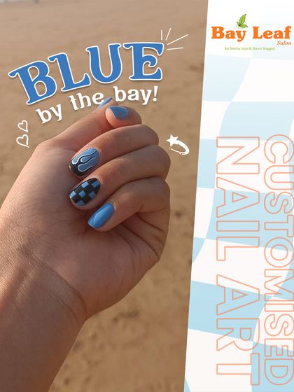Blue by the bay. This customized nail art has a cool, edgy vibe with a mix of solid blue, flame art, and a checkerboard pattern on short, natural nails.