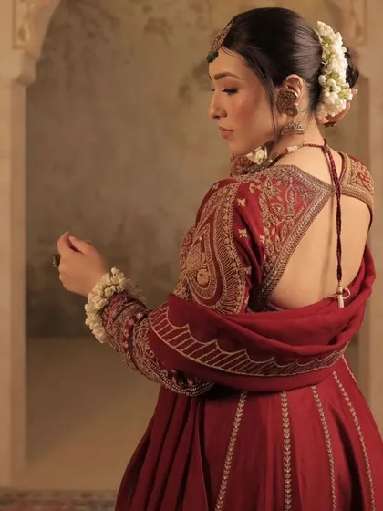 The back view of the elegant gajra bun, showing its clean lines and traditional charm.