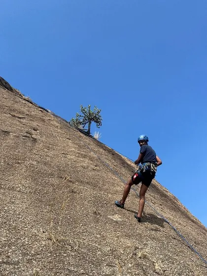 Meet Nanda, a tutor who discovered climbing at a campus event. Here he is on a slab climb, demonstrating the technique and balance this style requires.