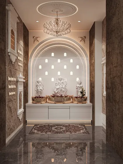 A serene and beautiful home mandir (prayer room). The visualization focuses on the intricate details of the marble statues, the arched niche with its many small lamps, and the ornate chandelier.