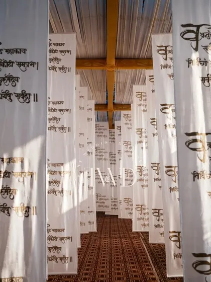 Walking through the corridor of chants. This installation was designed to make guests feel enveloped in positive energy and sacred vibrations from the moment they entered.