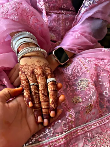 This is what stain goals are all about. The deep, reddish brown color is the result of my all natural, organic henna paste and proper aftercare. It's the perfect finishing touch for your bridal look.