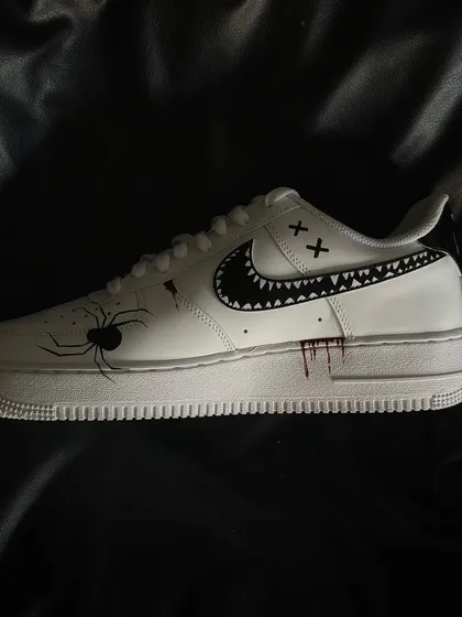 The other side of the Halloween custom sneaker, with a spider detail.