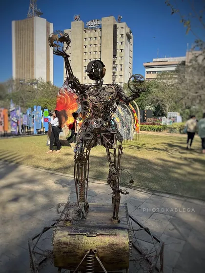 A sculpture made from scrap metal, showcasing the ingenuity of the artists. My photos highlight the texture and detail of these unique creations.