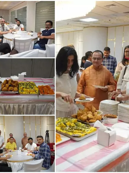Participants enjoying a meal together at one of our multi-city events. Sharing food, or 'Annadanam', is an important part of our community gatherings.