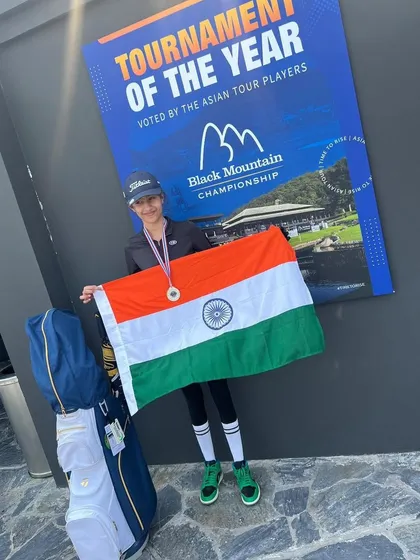 Prisca Sachdeva represents India at the JAGA Ryder Cup at Black Mountain, Thailand, holding the flag after securing 2nd place in her category.