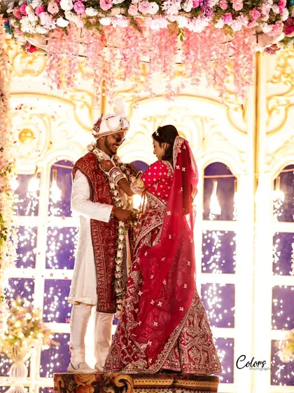 The Varmala exchange, a key moment where the couple garlands each other, signifying their acceptance.