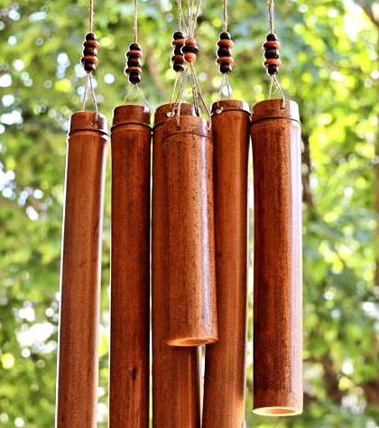 Our bamboo wind chime, featuring multiple tubes of varying lengths to create a soothing, natural sound. Hanging in a garden or on a balcony, it adds a peaceful, melodic element to your outdoor space.