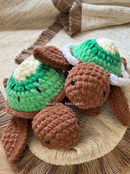 Our kiwi-themed chunky yarn turtles are a fresh and fun design. Made with soft brown and green yarn, they are a unique addition to our animal collection.