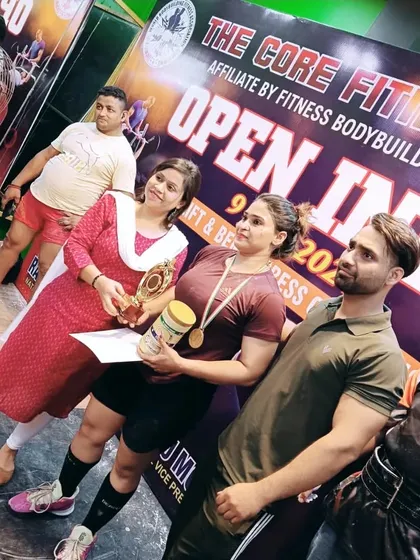 Celebrating a huge win. My client took home the gold medal at the deadlift and bench press championship. This is the kind of peak performance we train for.
