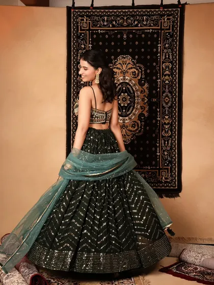 A back-facing shot that showcases the flow and volume of the lehenga skirt. The twirling motion adds life and movement, making it perfect for social media and online catalogs.