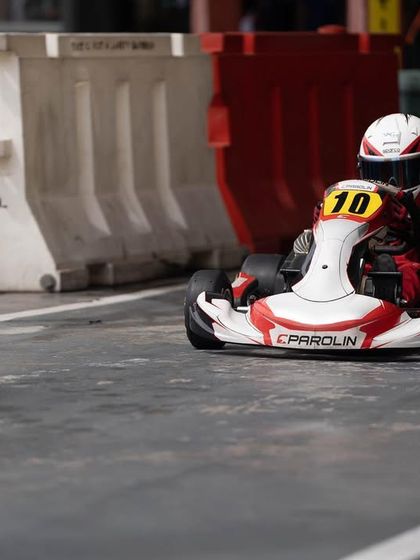 A young driver in a Parolin kart at the Rok Cup Singapore.