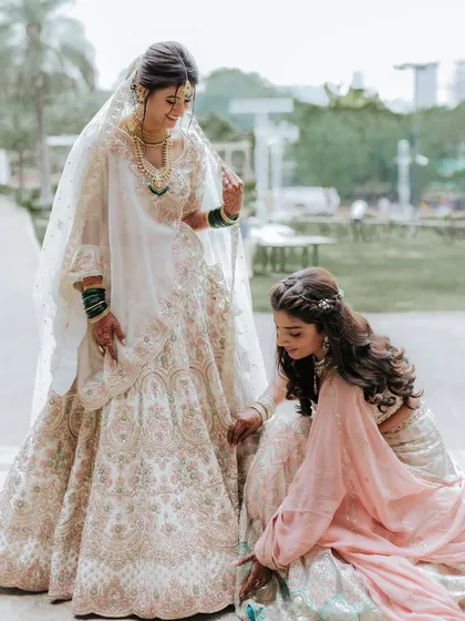 Helping with the final touches. It’s these little moments that make a wedding day so memorable.