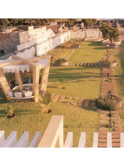 An overhead view of the CC Office garden and gazebo from 2002. This perspective shows the thoughtful layout of the pathways and seating areas, designed to create a tranquil and structured outdoor experience.